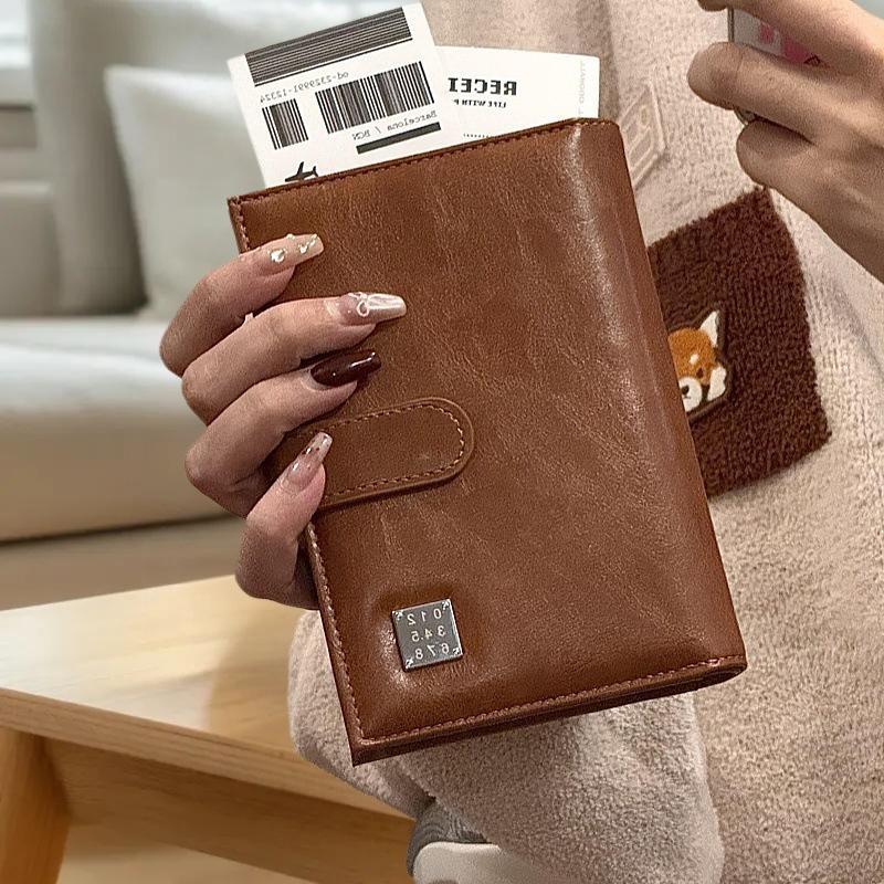 กระเป๋าใส่พาสปอร์ตสำหรับเดินทา - Qantas Travel Accessories บทวิจารณ์และราคา